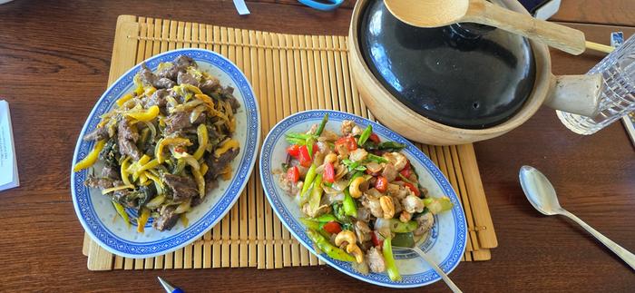 Stir fried chicken with cashew nuts, sliced duck breast with pickled mustard greens 
