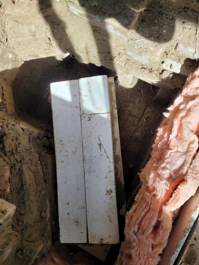 Ceramic fiberboard insulation under j tube burn tunnel