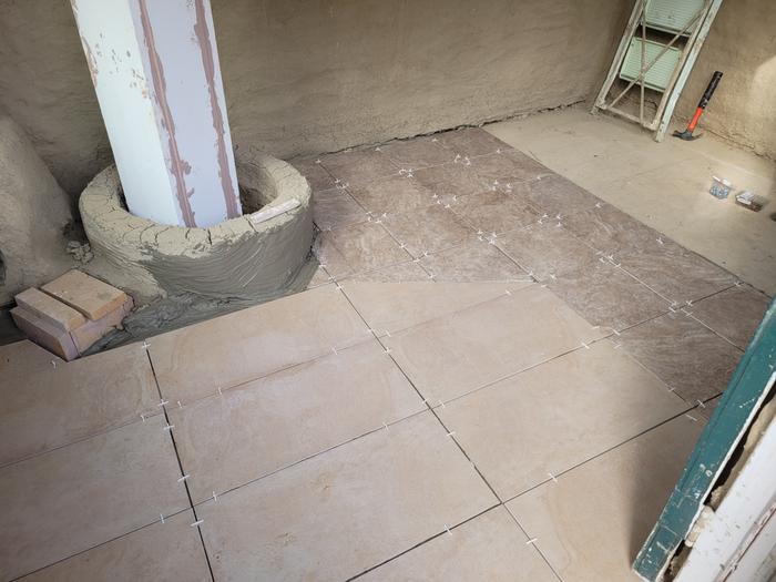 Tile around manifold