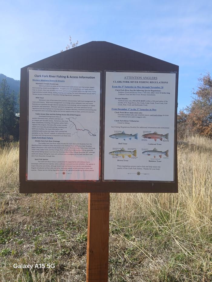 a sign showing the fishing regulations for the Clark Fork River