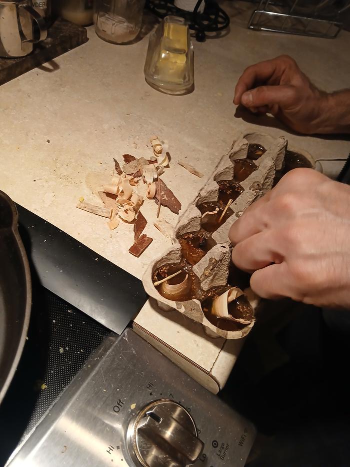 making natural fire starters with beeswax and wood shavings