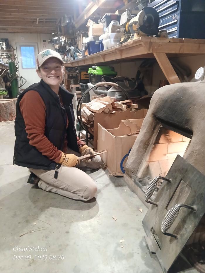 Molly's first time lighting a rocket mass heater 