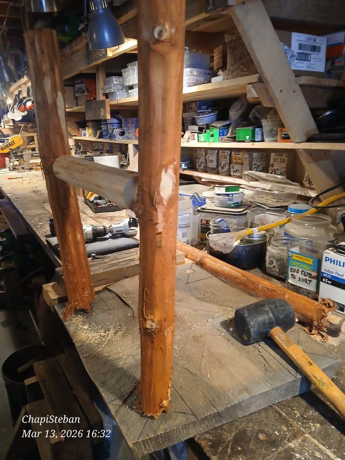 First stretcher installed in a table on a workbench in the shop