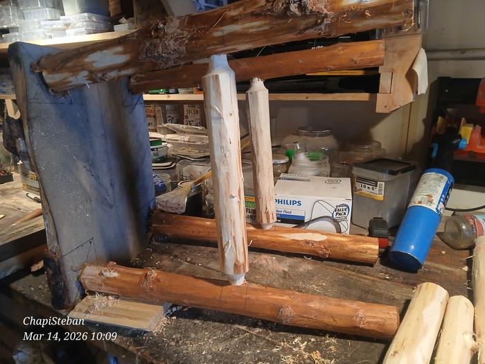 Two stretchers installed in an end table