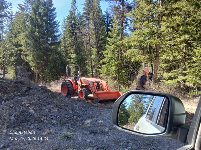 Stephen grading the road 