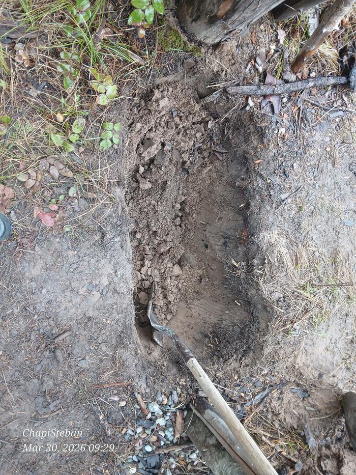 Footer hole dugged out ... will be laying 3" of gravel for the foundation 