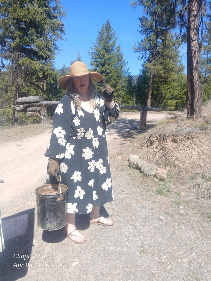 Melissa collecting buckets worth of gravel 