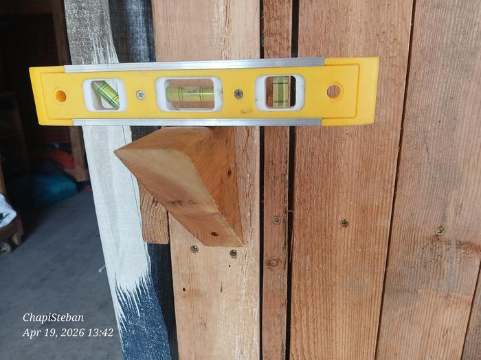 bullet level on a cleat that will support a wooden shelf