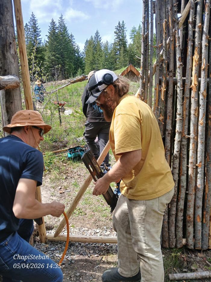 Seth assisting with nail gun hiccup .. such great teamwork 