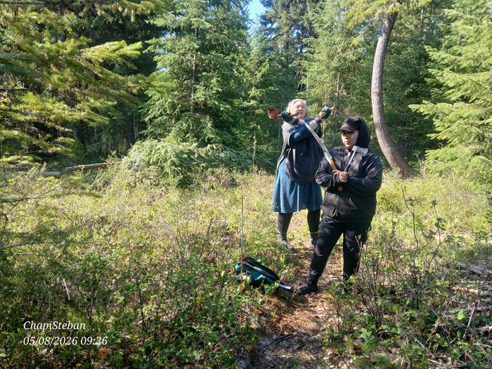 Melissa and Michelle just outside tipi gate, to harvest junkpole pickets 