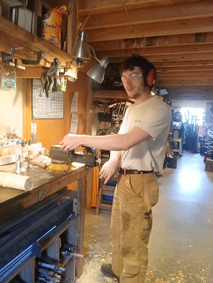Leo working on the firewood rack project 