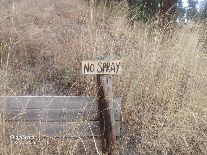 One sign installed to the east of the mailbox ... 