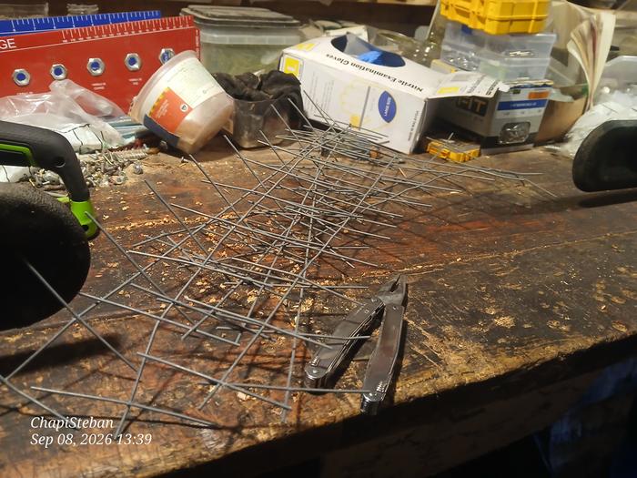 Some scrap fencing wire which will be processed to be used as twist ties ... another task that the Victorinox Spirit knocked out 