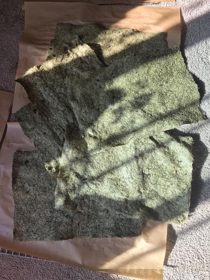 6 completed dry green sheets of paper