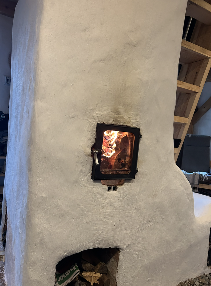 A double shoebox rocket masonry heater in Nova Scotia
