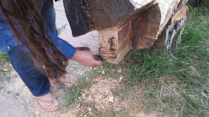 rubbing a mix of tung oil and wood ash into the tab