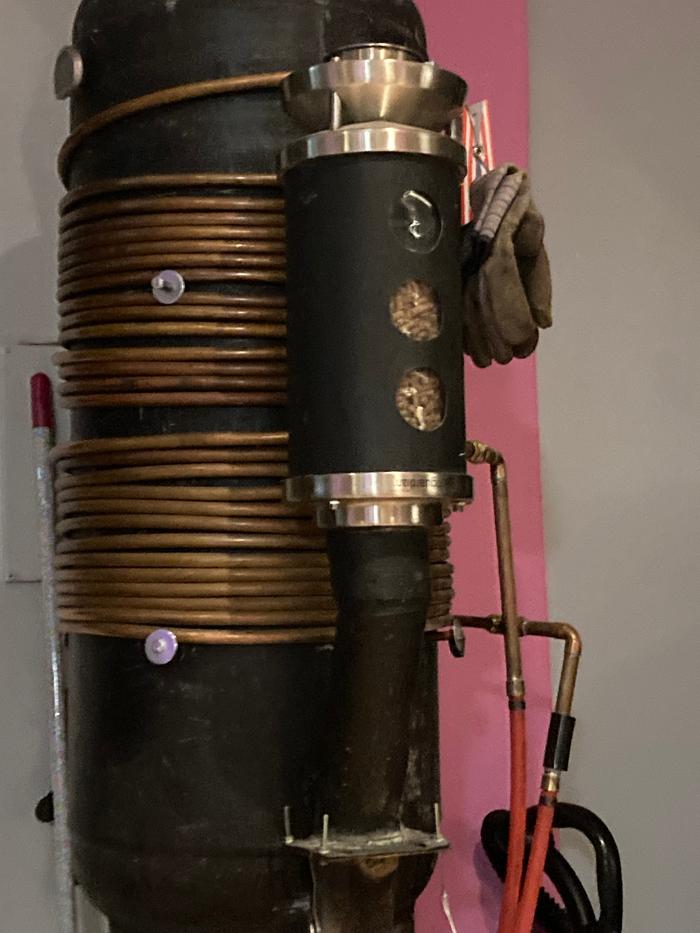 Pellet hopper and water heater