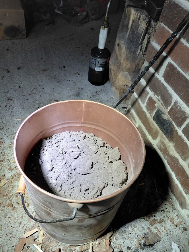 two batchboxes worth of ash