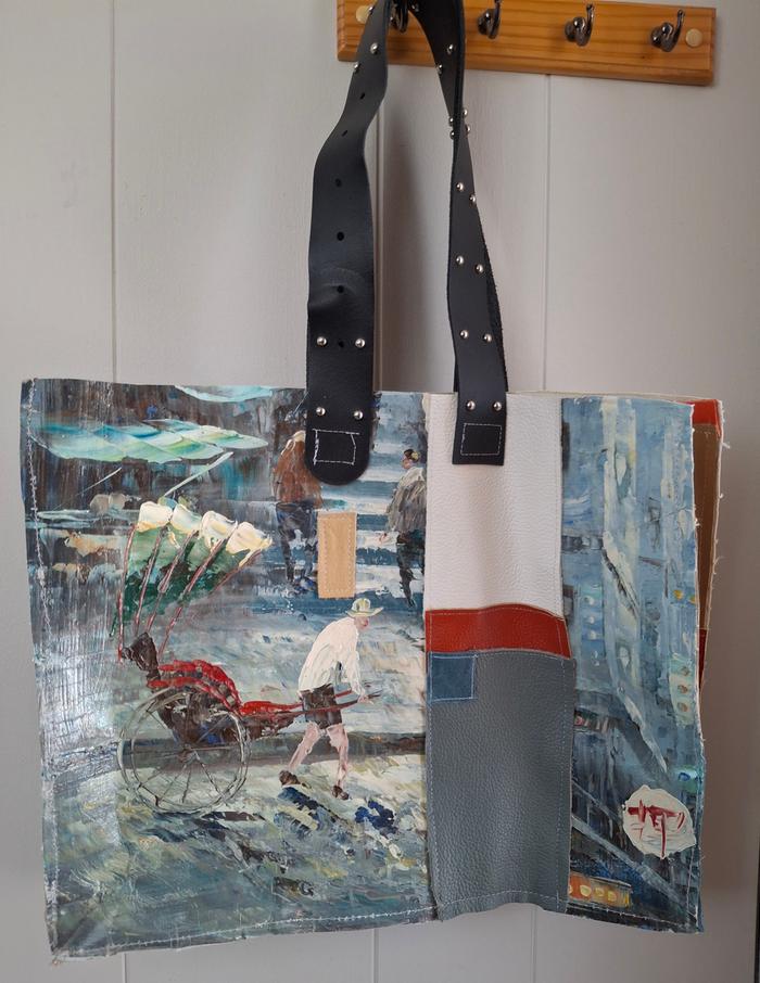 vintage canvas and leather bag with small patch