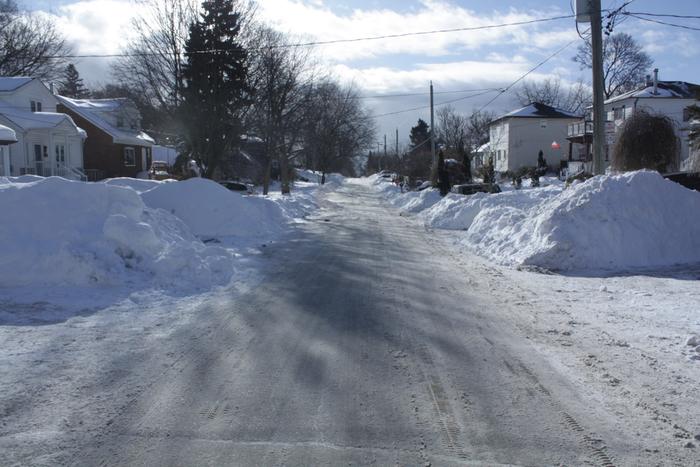 deep snow cleared from city road