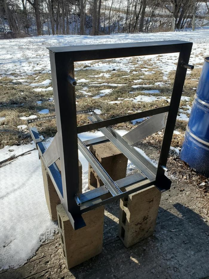 The base frame includes an upright "ring" that will act as the lintel. Air frame and oven bolt onto this.
