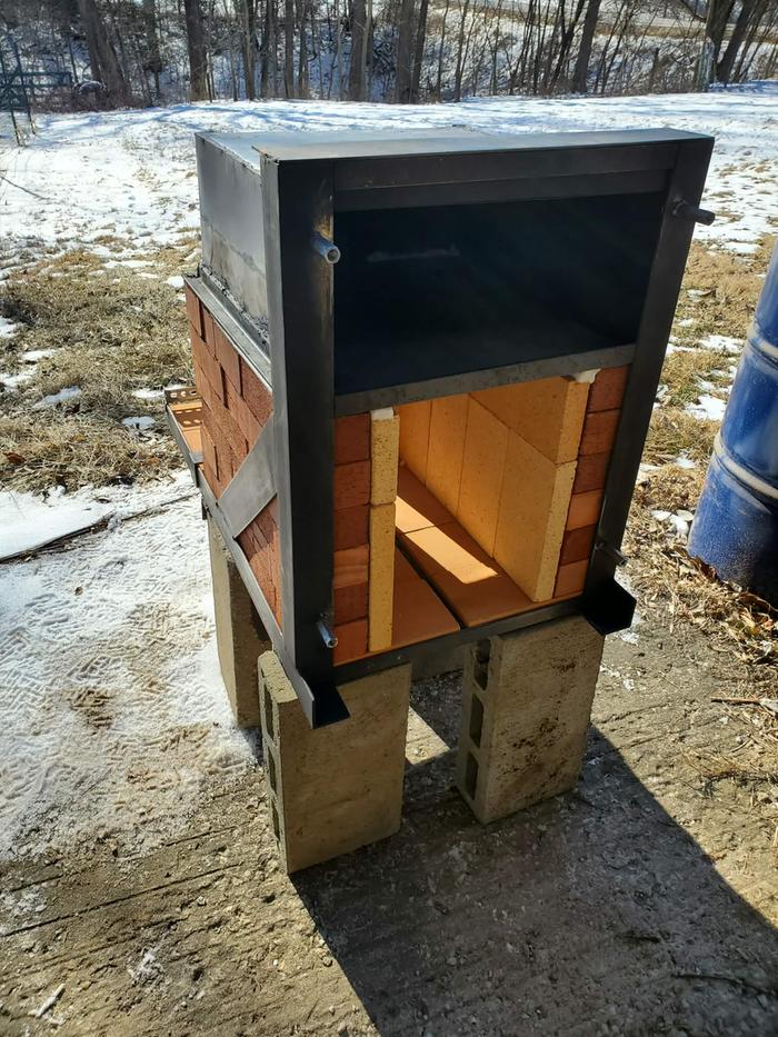 My ugly oven box is cobbled together from 22 gauge sheet metal and ringed with 1 inch angle iron for strength.