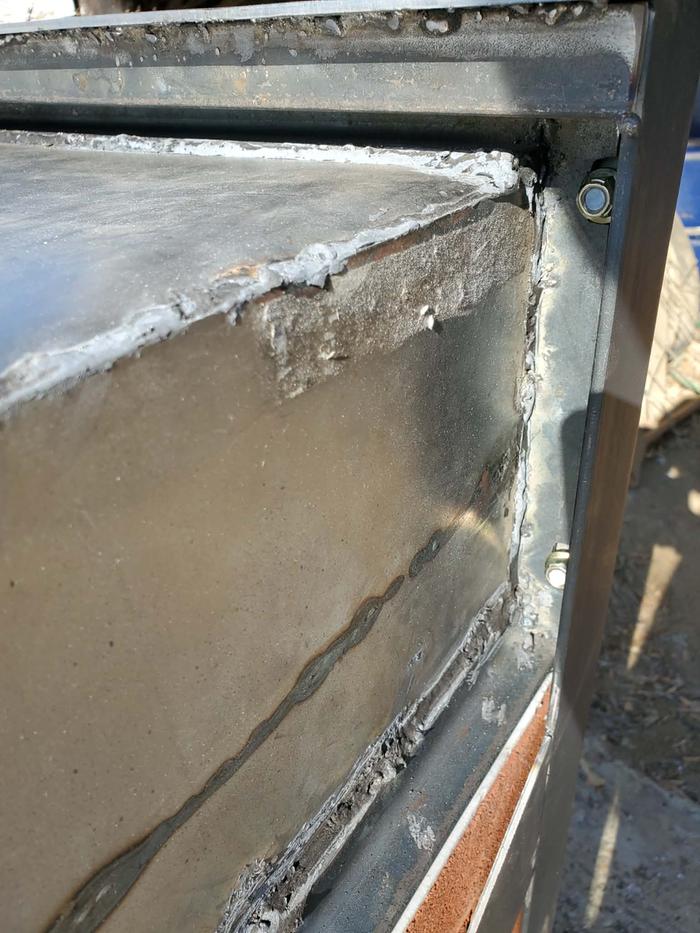 Oven box attaches to threaded studs on the frame ring.