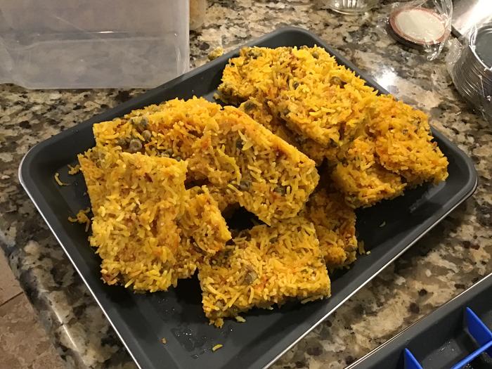 Blocks of frozen Greek rice