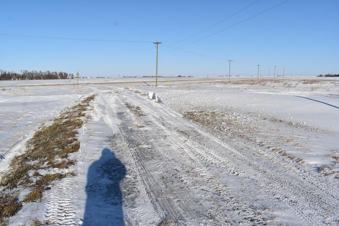 The driveway - a bit of snow was moved where it had drifted, but otherwise nearly bare