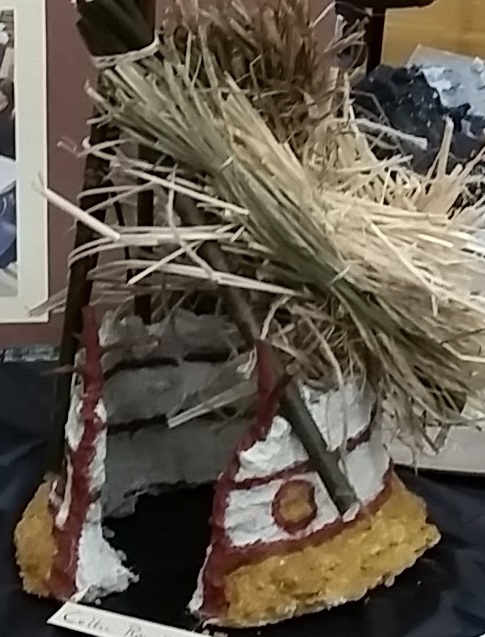 This is the celtic round house style--the owner of the above roof. Sorry for the low-resolution image!