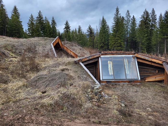 Looking at the WOFATI greenhouse with the abbey gable in the background.