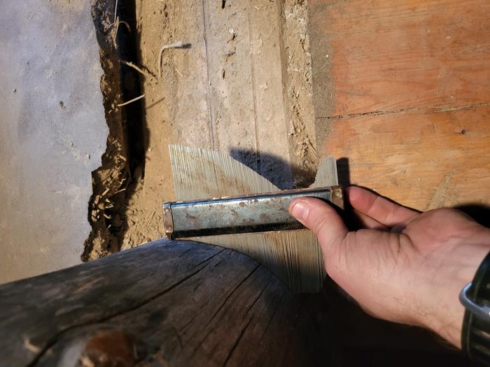 Used this contour gauge to get an accurate scribe of the round wood for the slab...