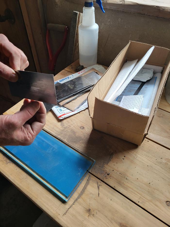 Stephen (and YouTube university) explained card scrappers to the team. 