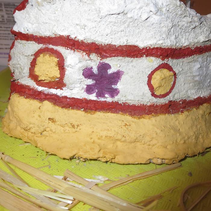 The middle stripe shows the old milk paint. You can see how bumpy it is compared to the new yellow paint below.