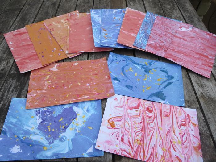 Marbled paper. The food dye made most of the color. The watercolor paint tended to stay in one place, making sprinkles