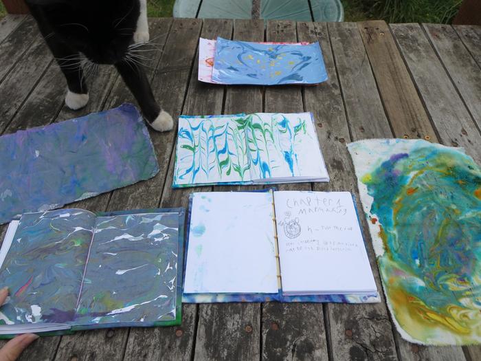 Marble cloth and covered books (with marbled fly pages)