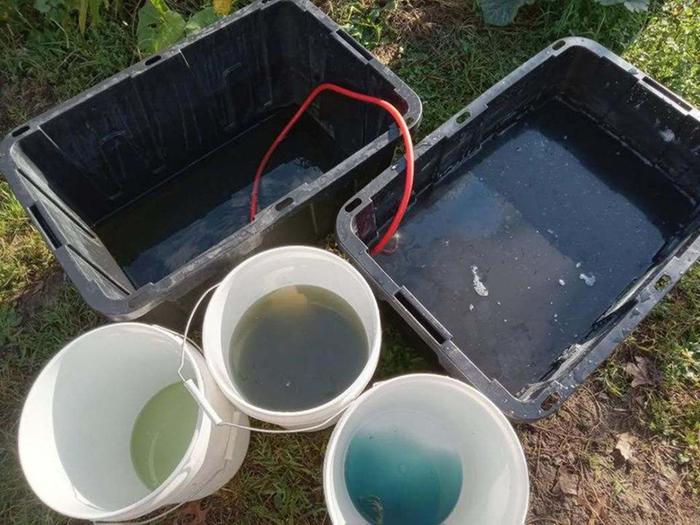 Settle and remove alkaline water. Neutralize before discarding