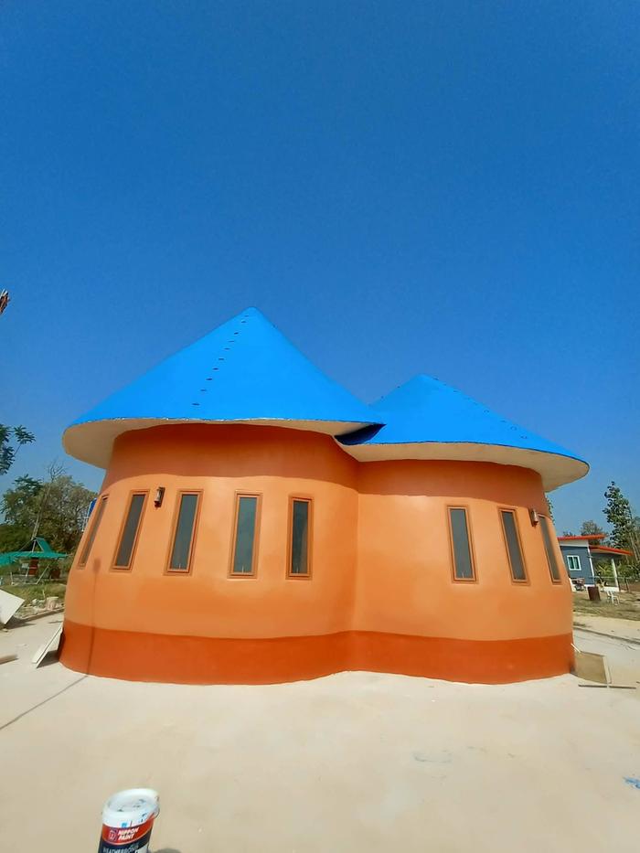 south front with small windows and round so the sun can only heat up a small segment at a time inside 