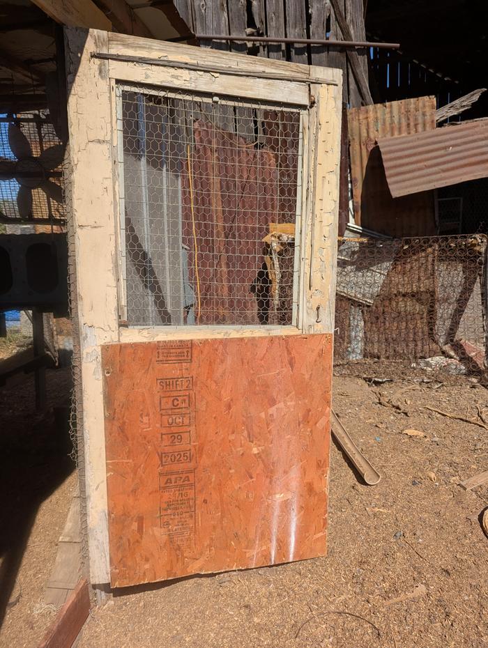 wood on the bottom, door is cut