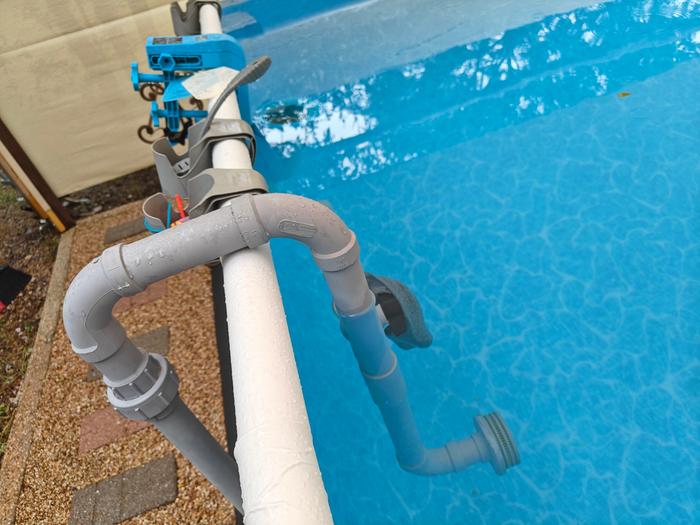 Suction line and skimmer at the other end