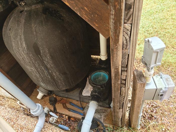300# sand filter and 120V speed pump on a GFCI circuit on a WiFi timer so I can turn it on and off from wherever I am off the battery on the solar isn't where I'd like it to be to stay off grid.