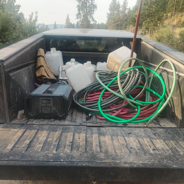 irrigation supplies in the back of a star wars truck