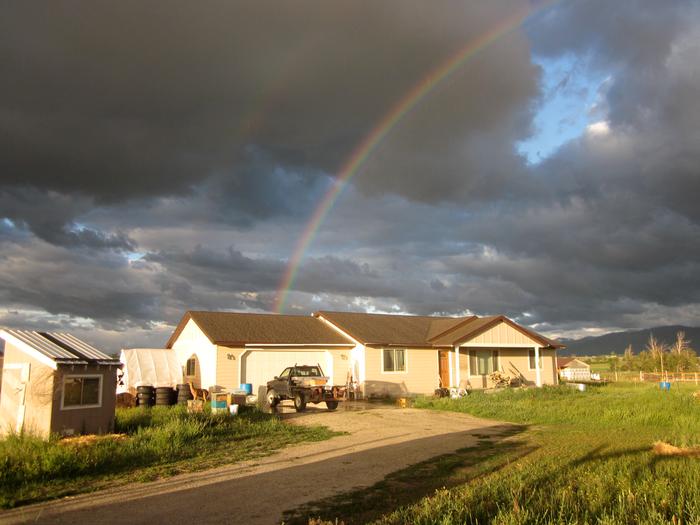 double rainbow sunrise in paradise
