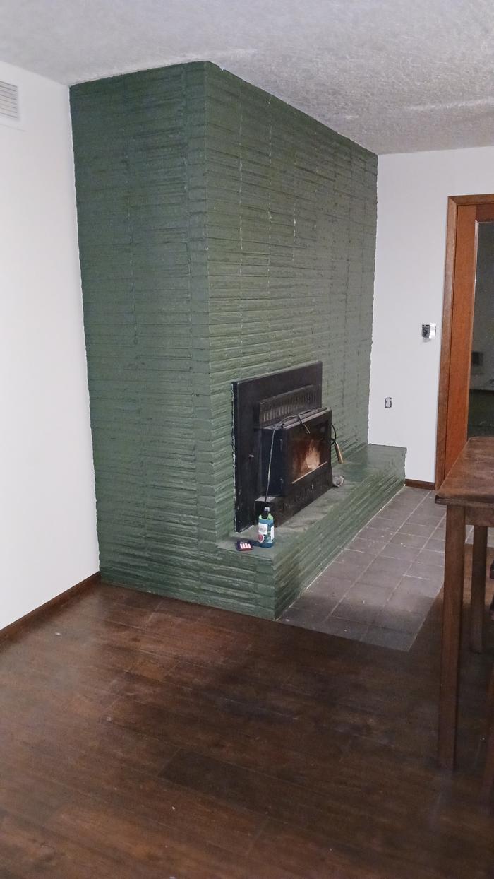 wood stove insert in the dining room