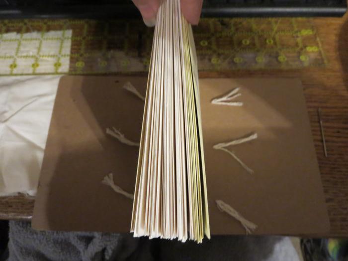 Then I realized I could even make them functional if I used an awl to poke through the chipboard and send the cords through!