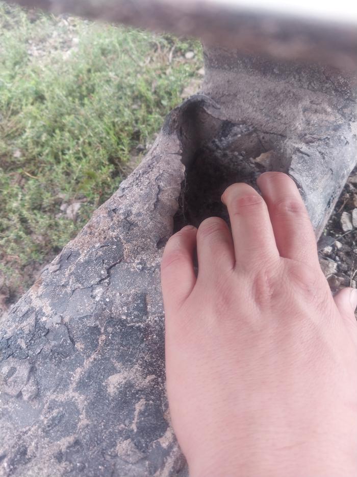 Death hole with my hand for scale 