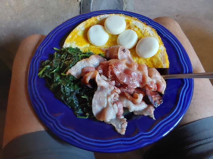 Bacon & eggs, plus sautéed spinach and babybel cheese (I have a weakness for that and good dark chocolate!) 