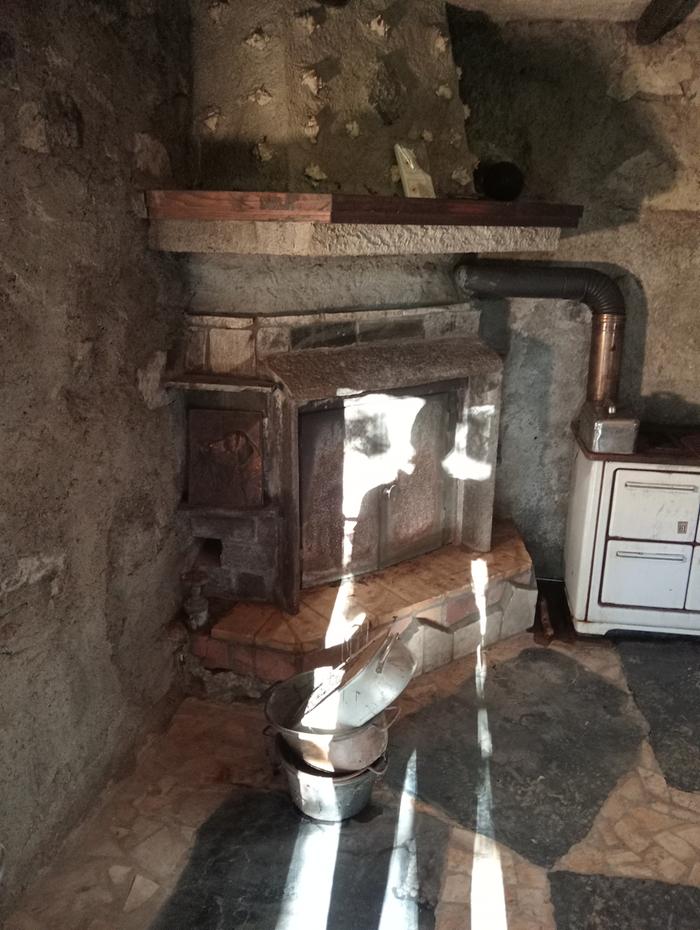 First, the old fireplace was demolished—the concrete from back in the day was incredibly tough!