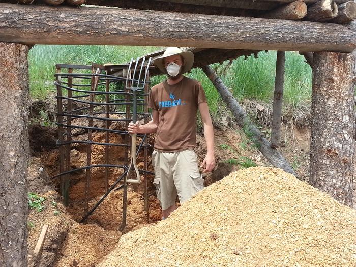 striking a classic pose in the middle of a smelly compost pile