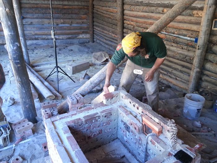 Nate working on the rocket kiln